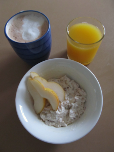 Fruit-muesli-mixed-with-Greek-yogurt-pear-with-chai-latte-and-orange-juice