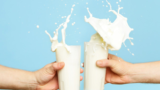 Toasting with Milk Glass